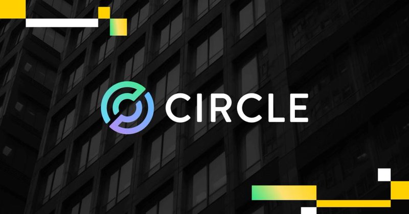 Circle logo in front of a building