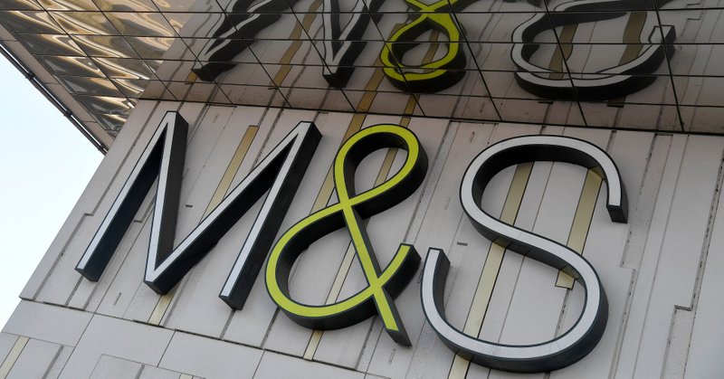 A logo of food and clothes' retailer Marks and Spencer (M&S) is seen at a branch in London, Britain March 10, 2022. REUTERS/Toby Melville/File Photo