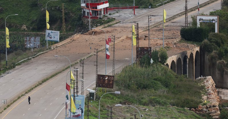 Debris covers the damaged area of a bridge after an Israeli strike, following an escalation between Hezbollah and Israel, amid the U.S.-Israeli conflict with Iran, near Qasmiyeh, Lebanon, March 22, 2026. REUTERS/Amr Abdallah Dalsh