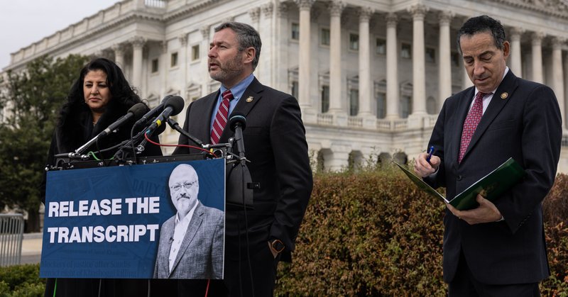 Representative Eugene Vindman, center, with Hanan Elatr Khashoggi, the widow of the murdered journalist Jamal Khashoggi, and Representative Jamie Raskin at the Capitol on Friday.