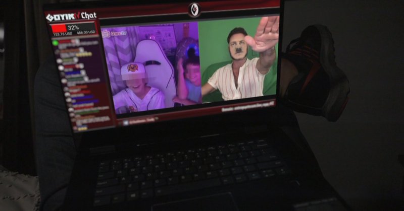 Jon Minadeo in monitor with boys.png