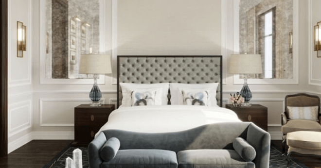 Luxury hotel guest room featuring Crestron Guest Room Management System (GRMS) for automated lighting and climate control.