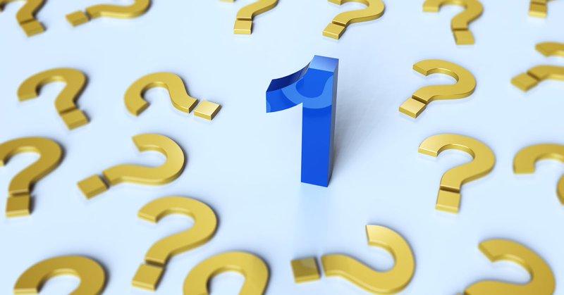 Gold question marks and a blue number 1 against a light blur background