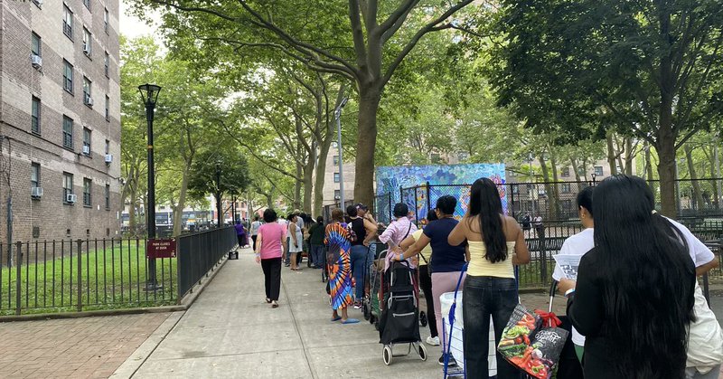 An undated file photo of New Yorkers lining up to receive food assistance at a pantry.