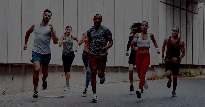 A team of runners in motion, symbolizing the speed, coordination, and agility required in multi-entity accounting teams using the right software tools.