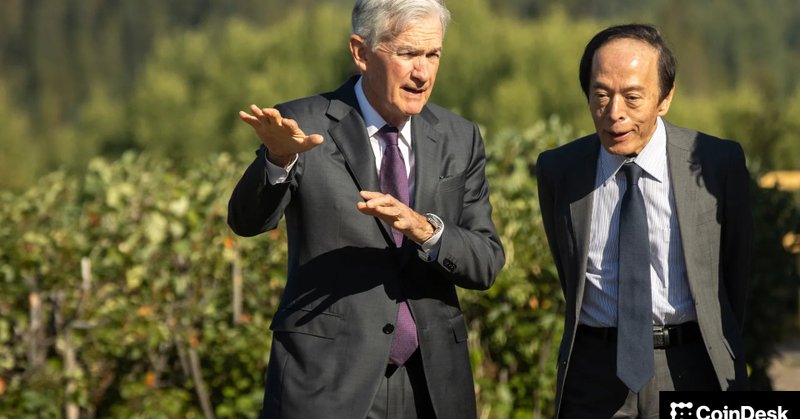 Federal Reserve Chairman Jerome Powell walks with Bank of Japan Governor Kazuo Ueda in Grand Teton National Park
