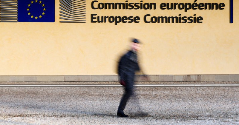 A person walks past the entrance of the European Commission headquarters in Brussels, Belgium, February 26, 2026. REUTERS/Yves Herman/File Photo