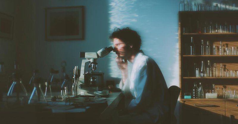 Scientist at Microscope