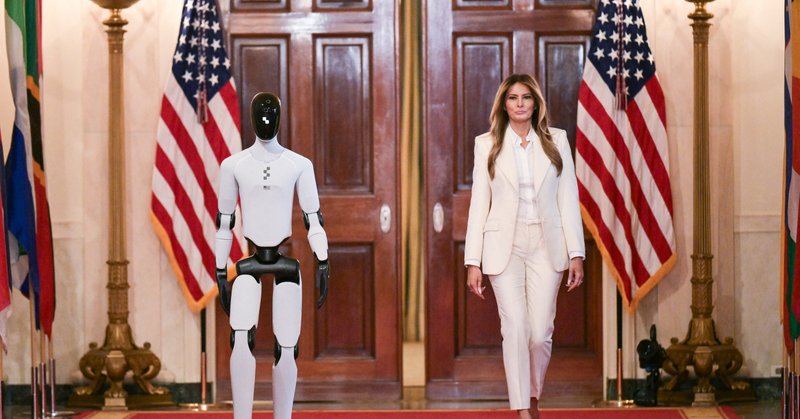Melania Trump, the first lady, with Figure 3, a humanoid robot developed by Figure AI, an artificial intelligence robotics company.
