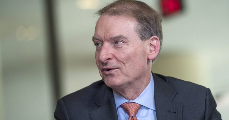 Paul Atkins speaks at a conference.