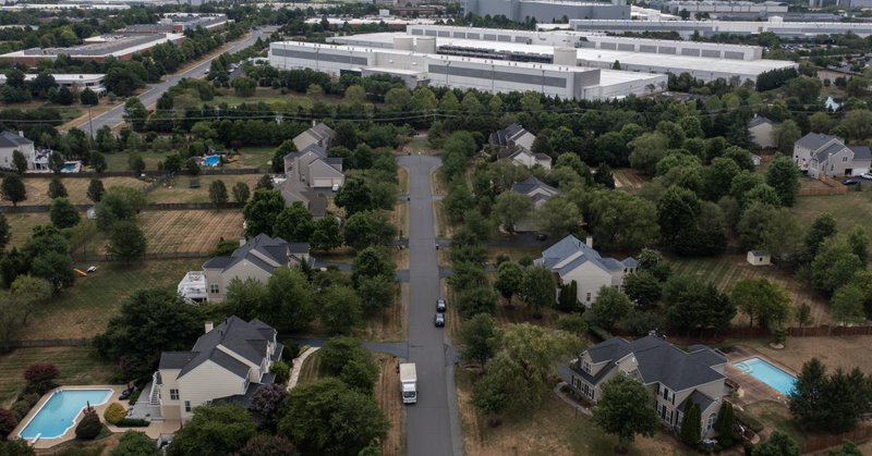Various data centers are shown situated near a neighborhood on July 17, 2024 in Ashburn, Virginia. Northern Virginia is the largest data center market in the world, but is facing headwinds from availability of land and electric power. | (Getty Images)