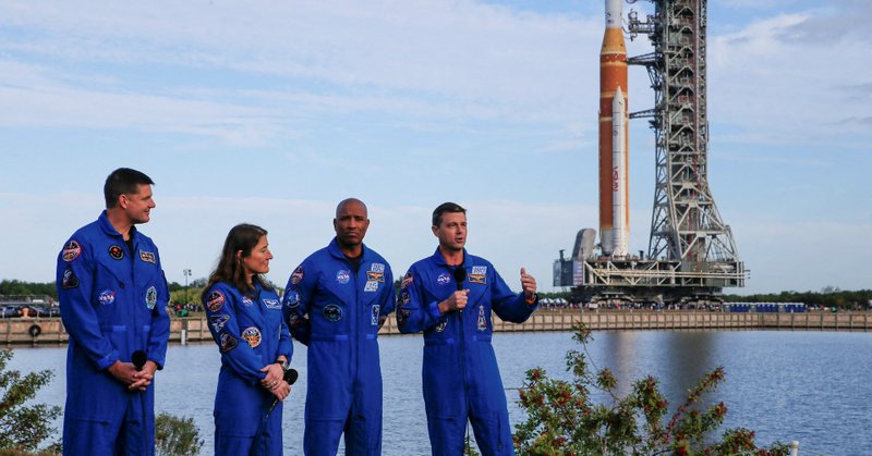 Artemis II mission's Commander Reid Wiseman speaks next to pilot Victor Glover, mission specialists Christina Koch and Jeremy Hansen during the rollout of NASA's next-generation moon rocket, the Space Launch System (SLS) rocket with the Orion crew capsule, to the launch pad at the Kennedy Space Center in Cape Canaveral, Florida, U.S., January 17, 2026. REUTERS/Joe Skipper