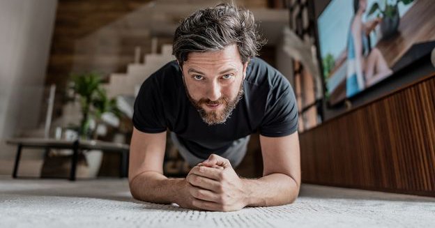 A man faces the camera in the plank position (Credit: Getty Images)