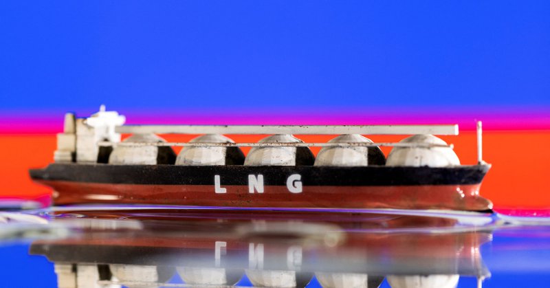 Model of LNG tanker is seen in front of Russia's flag in this illustration taken May 19, 2022. REUTERS/Dado Ruvic/Illustration/File Photo