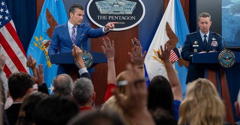 Defense Secretary Pete Hegseth points out a journalist in a press conference at the Pentagon