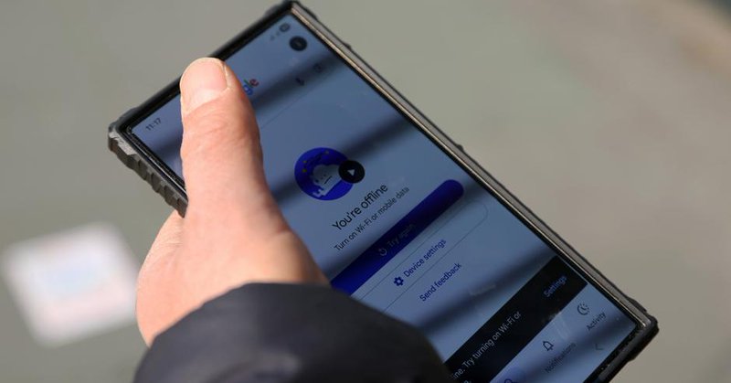 A mobile telephone in somebody's hand