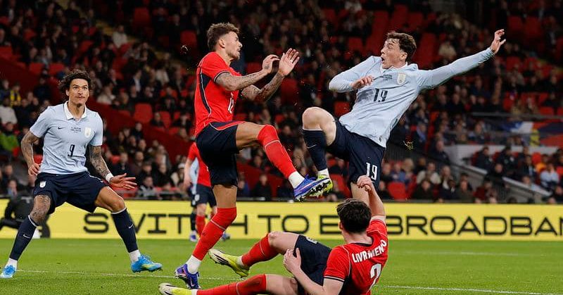 Featured image for Soccer-Uruguay grab late draw with England after White booed