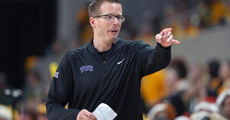 Coach Mark Campbell of the TCU Horned Frogs points to the bench against the Baylor Bears on Feb. 12, 2026, in Waco, Texas.