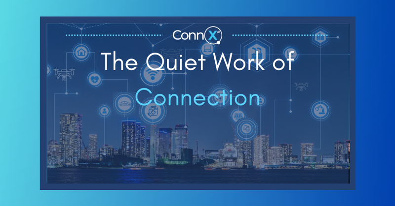 City skyline at night overlaid with connected digital icons representing infrastructure systems, with the title “The Quiet Work of Connection.”