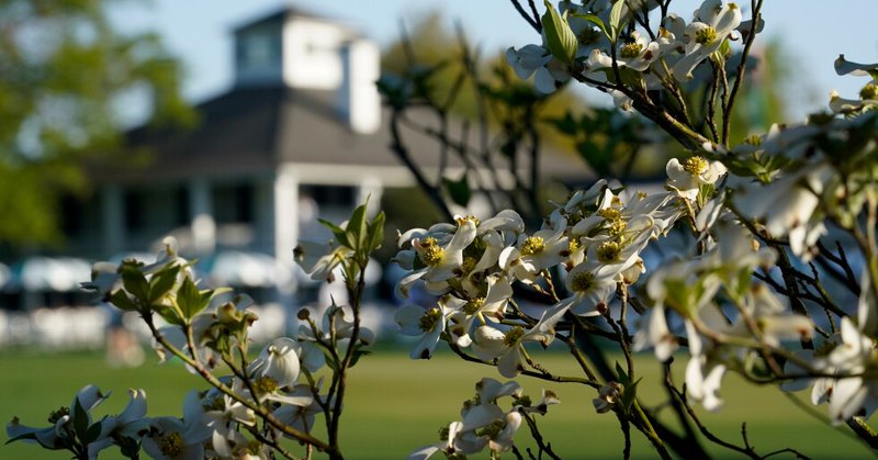 Dogwood flowers frame the clubhouse during a practice round for the Masters golf tournament on April 5, 2021, in Augusta, Ga. (AP Photo/David J. Phillip, File)