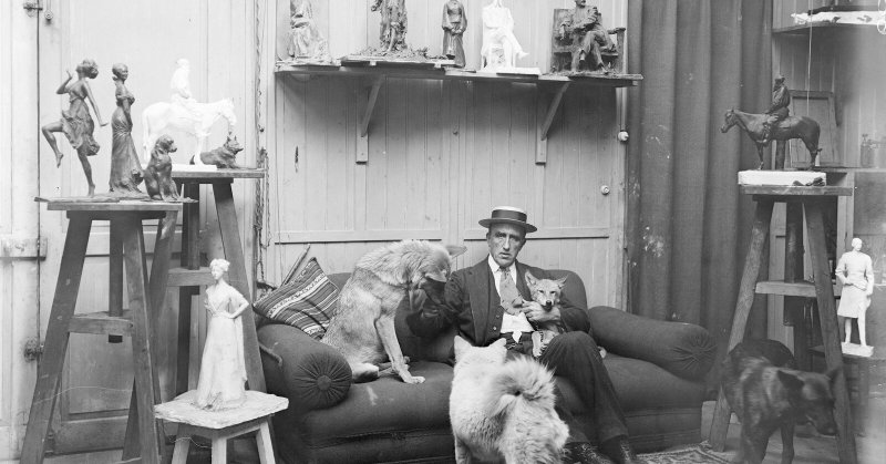 Paul Troubetzkoy in his Paris studio, with his pet wolves, sometime between 1909 and 1914.