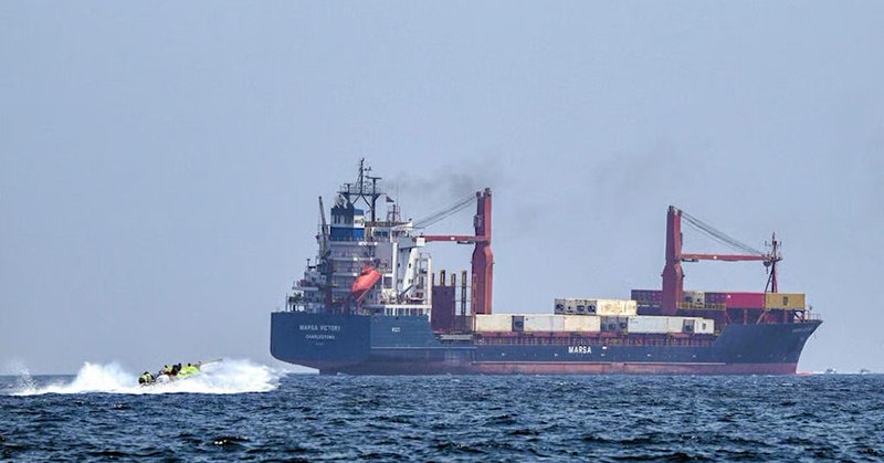 An undated photo of an Egyptian cargo ship in the Strait of Hormuz (Giuseppe CACACE / AFP)