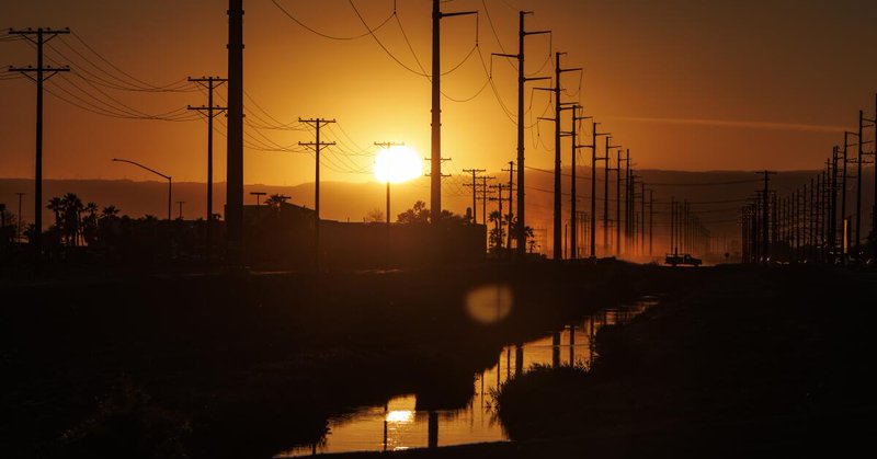 IMPERIAL, CA - MARCH 12, 2026: A dusty haze settles over the City of Imperial at dusk near the site of a proposed 950,000 square foot data center on March 12, 2026 in Imperial, CA. Many residents are concerned about the health and environmental issues a data center could bring to the community. (Gina Ferazzi / Los Angeles Times)