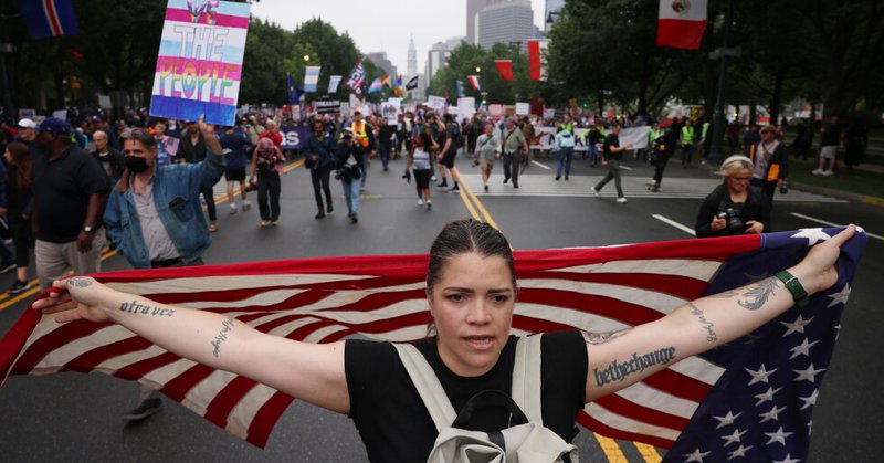 Demonstrators march down Benjamin Franklin Parkway during the "No Kings" protest, June 14, 2025, in Philadelphia. (AP Photo/Yuki Iwamura, File)