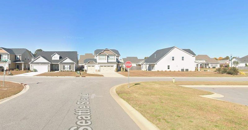 An off-duty police officer is accused of killing another off-duty officer in a domestic incident along this sleepy block in Cumberland County NC, the sheriff said.