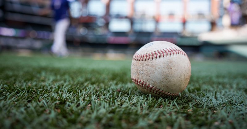 A ball rests in foul territory at the Texas Rangers take batting practice before an exhibition baseball game against the Kansas City Royals at Globe Life Field on Monday, March 23, 2026, in Arlington.