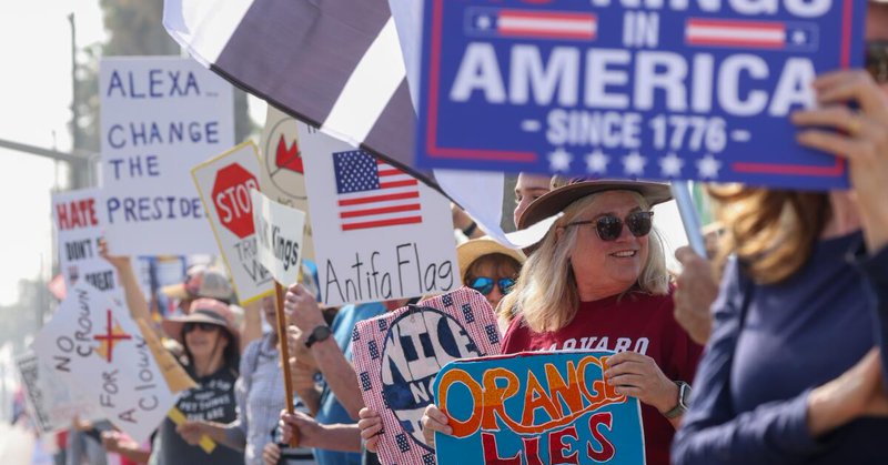 Huntington Beach, CA - March 28: Citizens gather at a No Kings protest along Pacific Coast Highway in Huntington Beach, CA on Saturday, March 28, 2026. (Genaro Molina/Los Angeles Times)