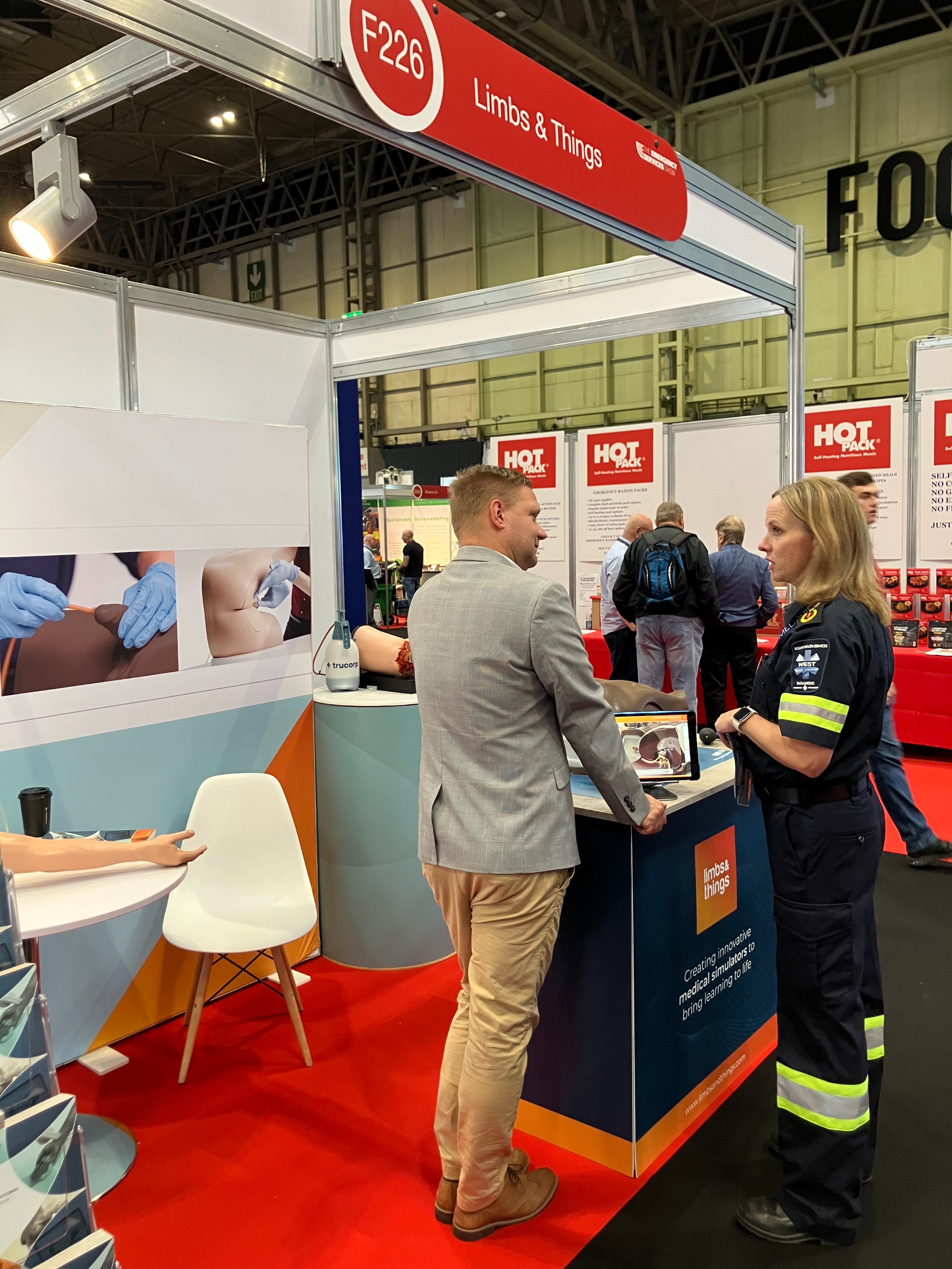 Customer at Limbs & Things booth at ESS