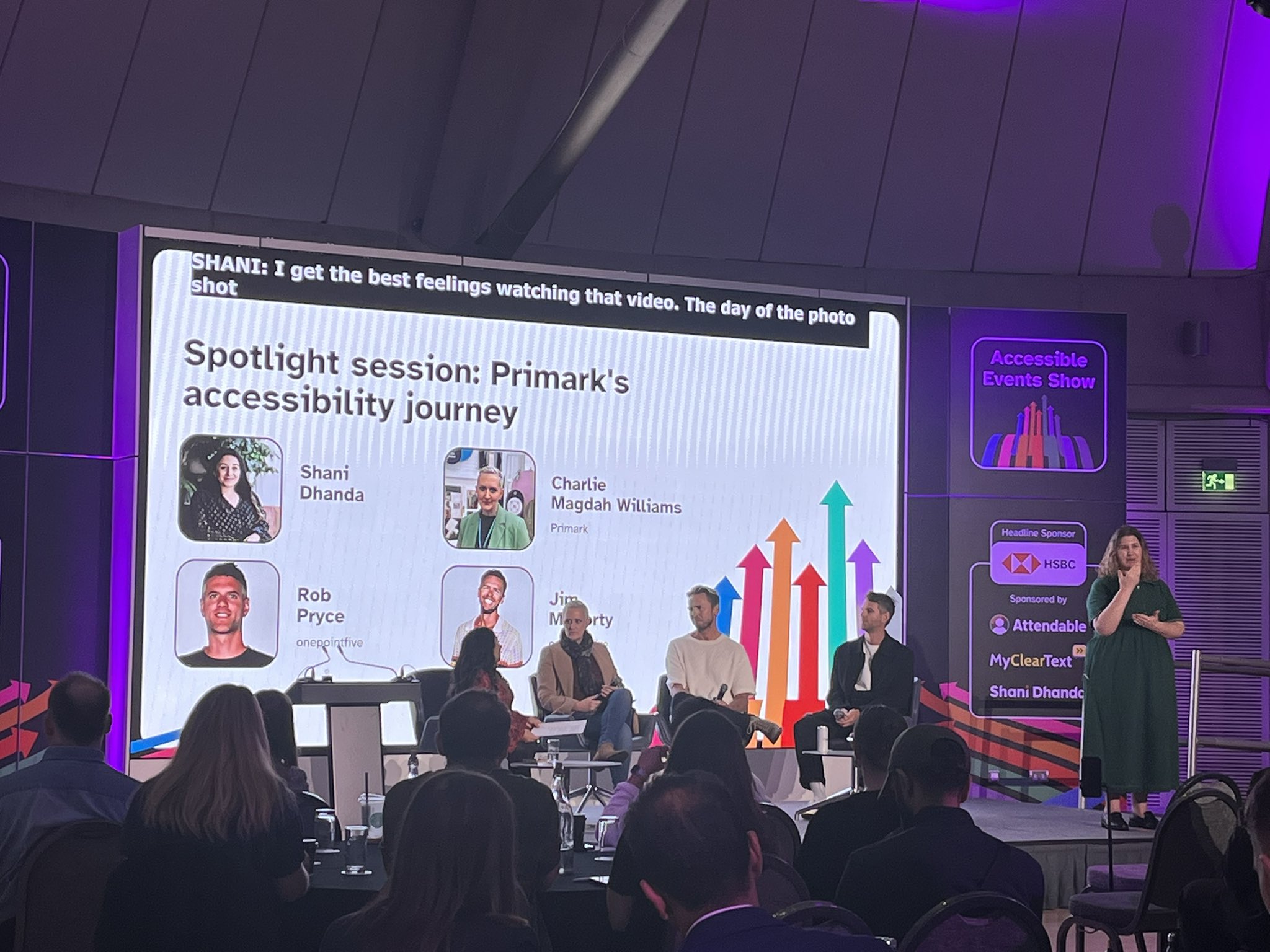 Image shows 4 speakers on a stage sitting in front of of a giant screen with the words : Spotlight Session : Primark’s accessibility journey.  The session is looking at how clothing retailer Primark has launched an adaptive clothing range - taking in not just design and suitability but how to make a studio accessible.