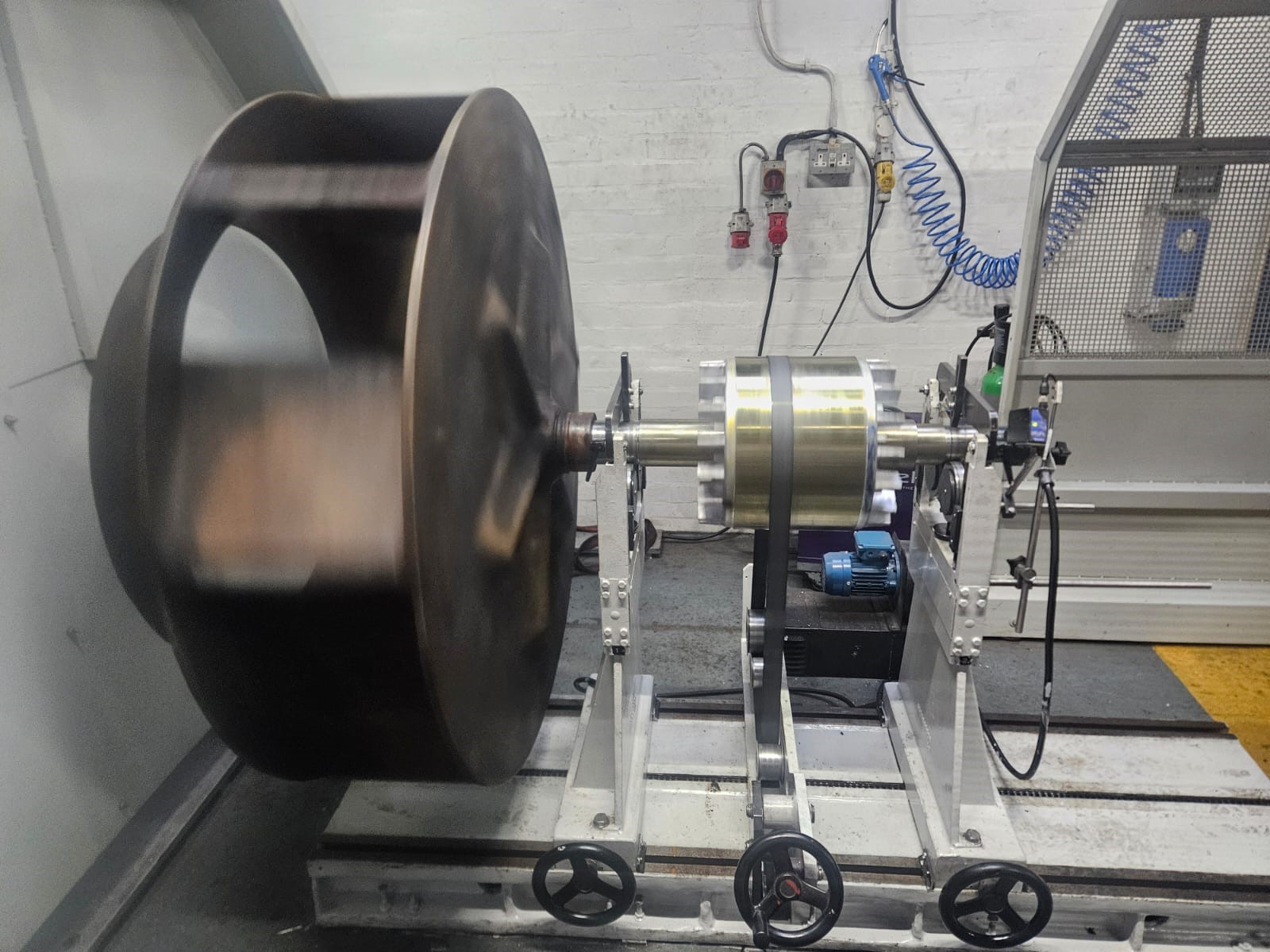 Dynamic balancing of an extraction fan impeller at Webb-Elec Limited.