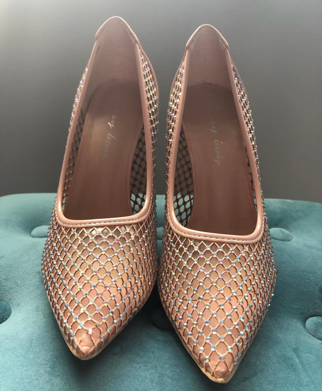 Sissy Boy Nude Sparkle Heels displayed on blue cushion, silhouette finished with a sheer mesh overlay and shimmering rhinestone detail. Crafted in a soft nude-pink tone.
https://www.theshoppingcart.co.za/product-page/sissy-boy-nude-sparkle-heels
