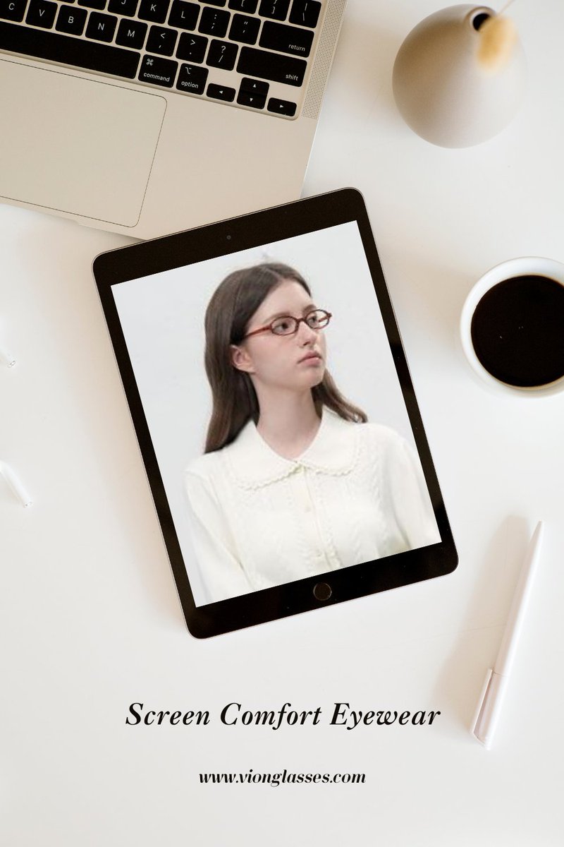 A tablet displaying a woman wearing oval blue-light filtering glasses, placed on a desk beside a laptop, screen devices.