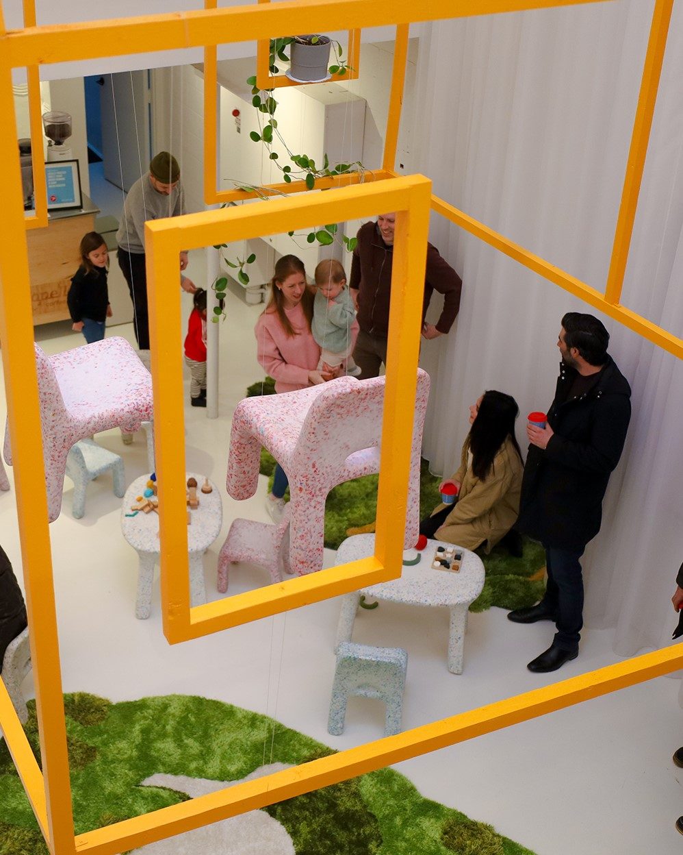 People exploring an exhibit at the DesignTO festival.