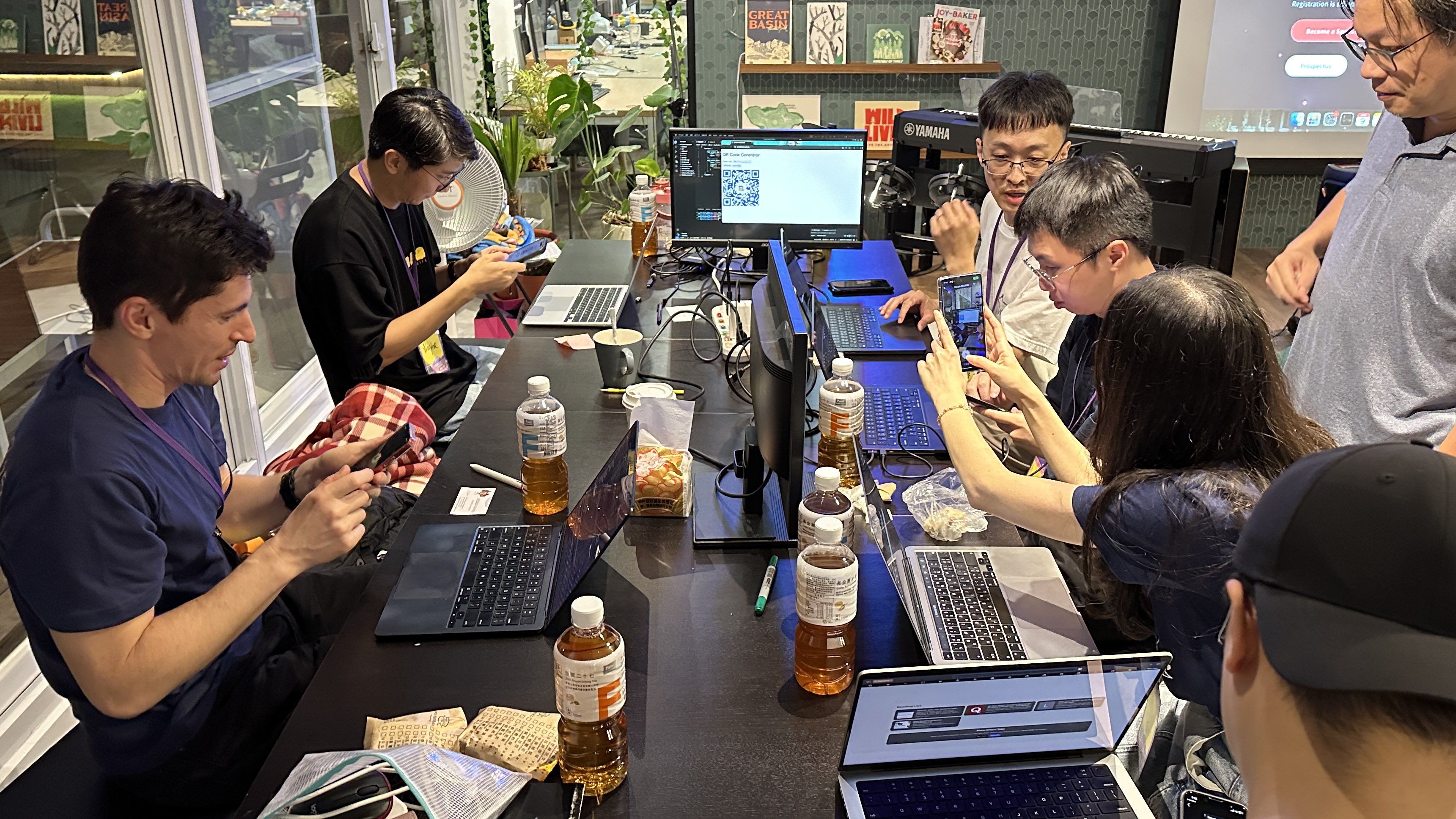 Everyone scanning the meeting QR code to share screens.