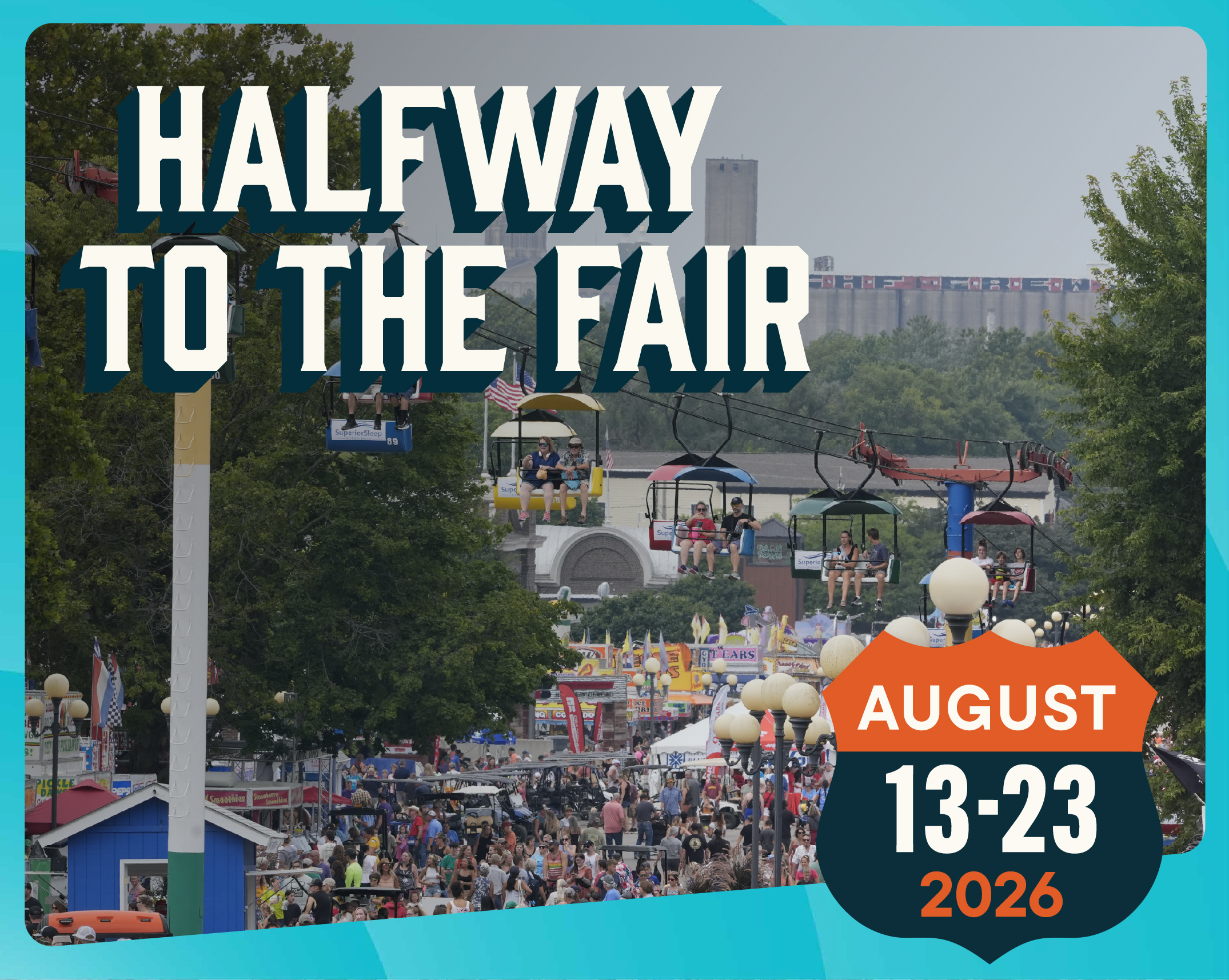 A photo of Grand Ave. full of people during the Fair. "Halfway to the Fair" is displayed in the top left corner with August 13-23 in the bottom right.