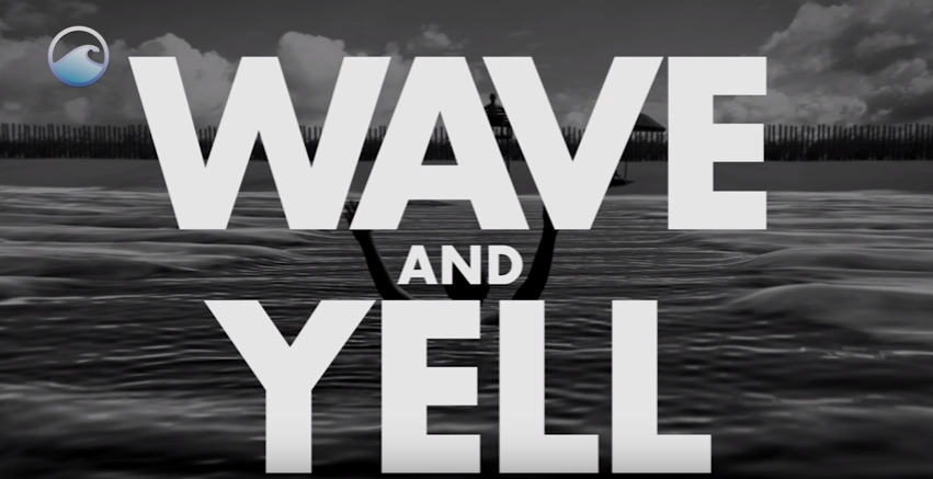 A person is waving for help in the water in this black and white image with text that states WAVE and YELL, which refers to the actions to take to get the lifeguard’s attention if caught in a rip current.