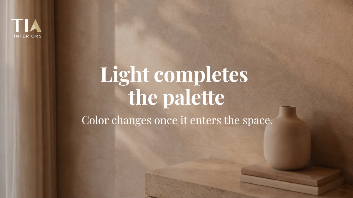 Sunlight grazing a textured wall with soft shadows in beige and taupe tones.