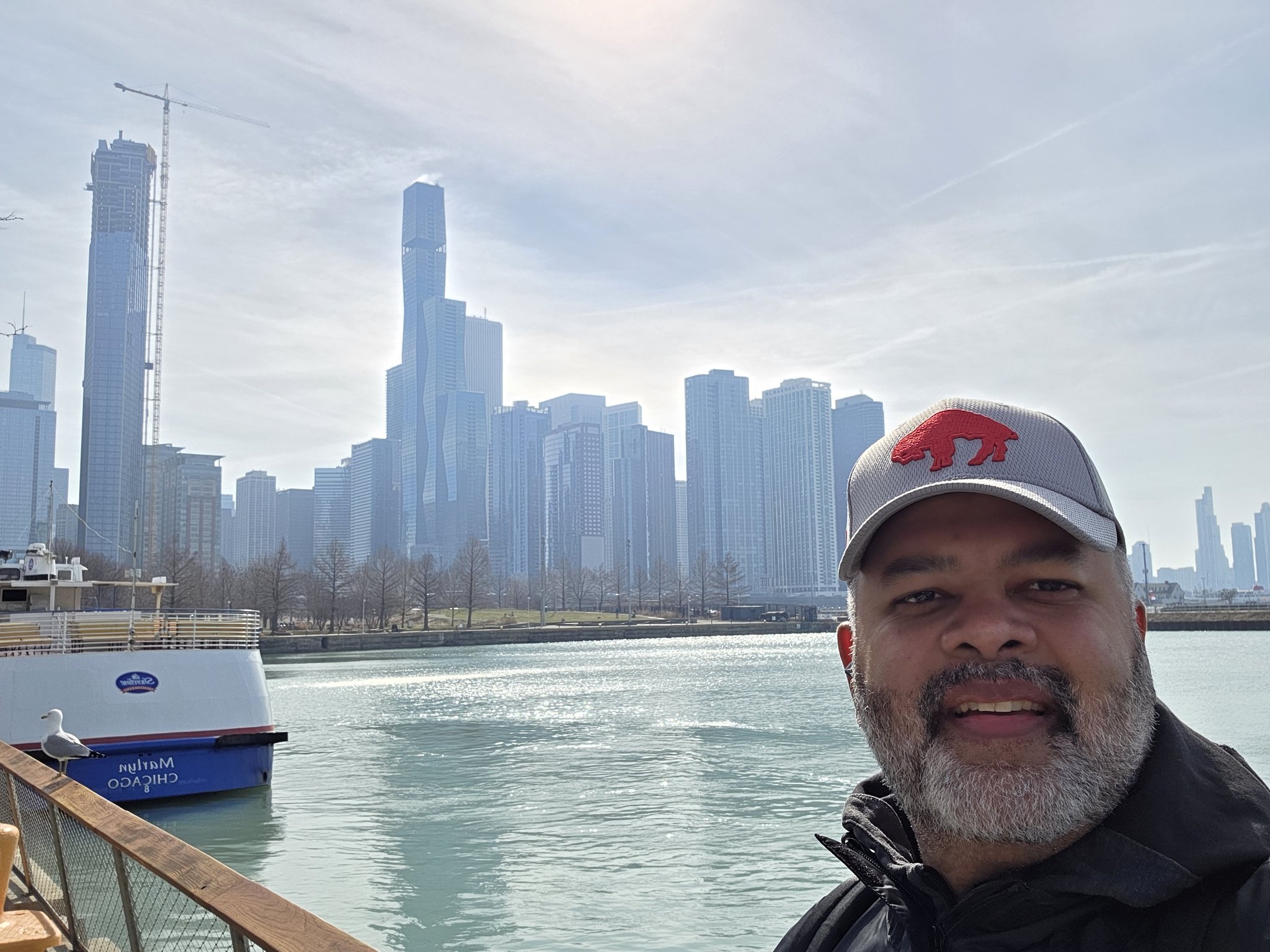 Selfie with chicago skyline in background. 