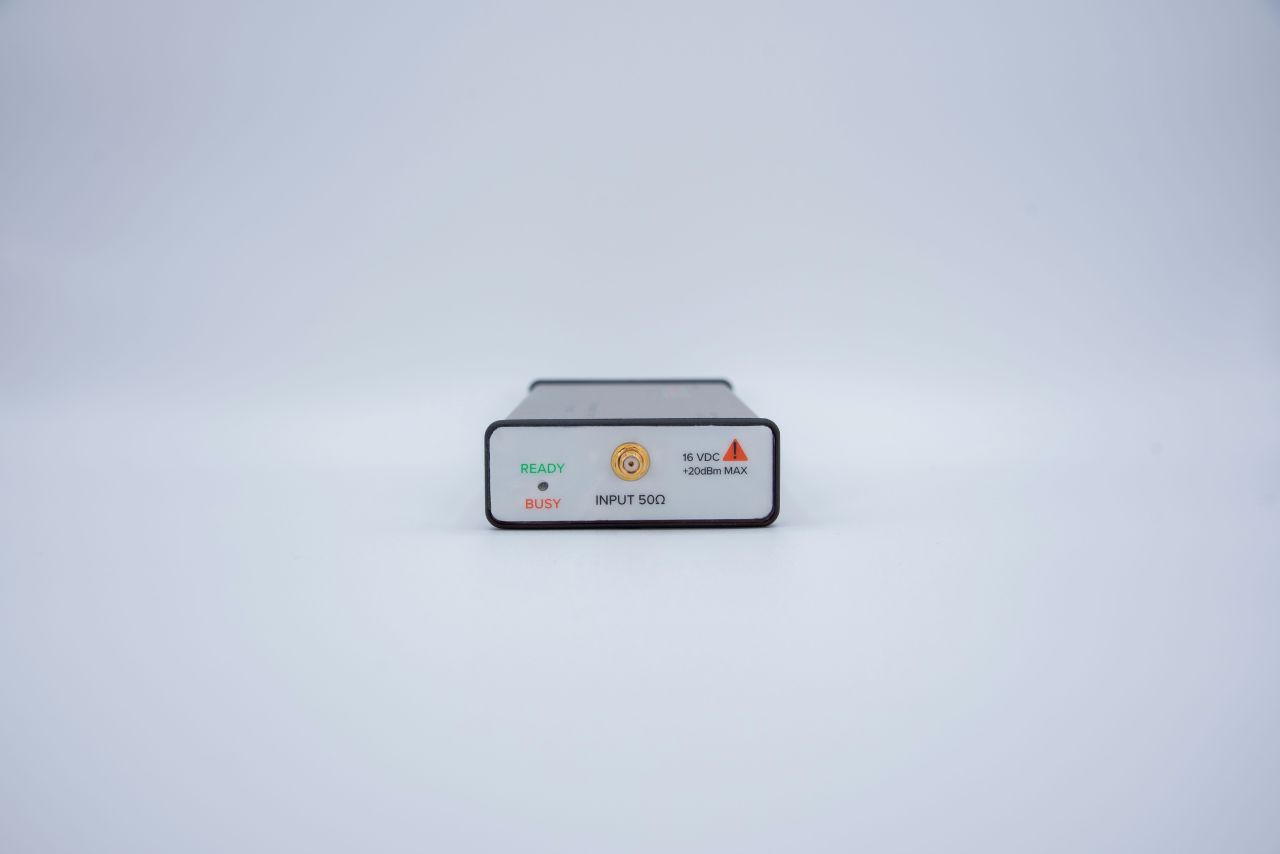 A close-up of the side of the BB60D with indicators labeled "READY," "BUSY," and "INPUT 500" against a clear, white background.