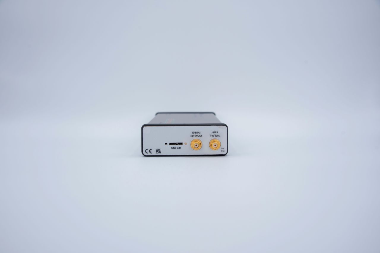 A different side view of the BB60D with two yellow ports and product identifiers on a plain white background.