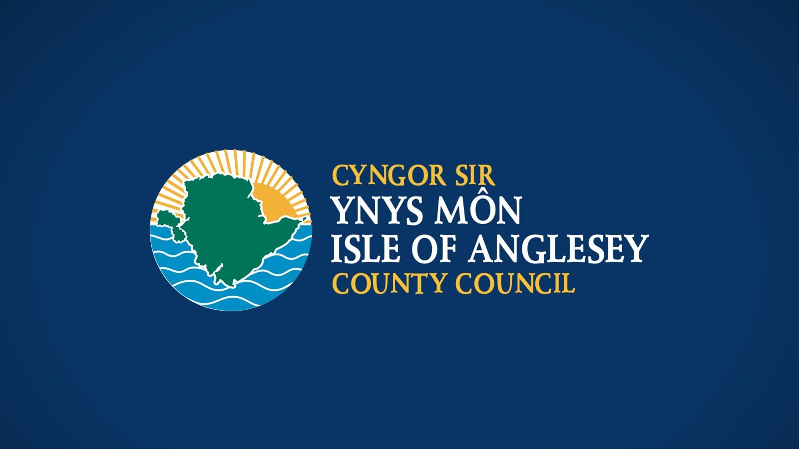 Logo of Isle of Anglesey County Council featuring a green island silhouette against a sun and sea background on a blue field.