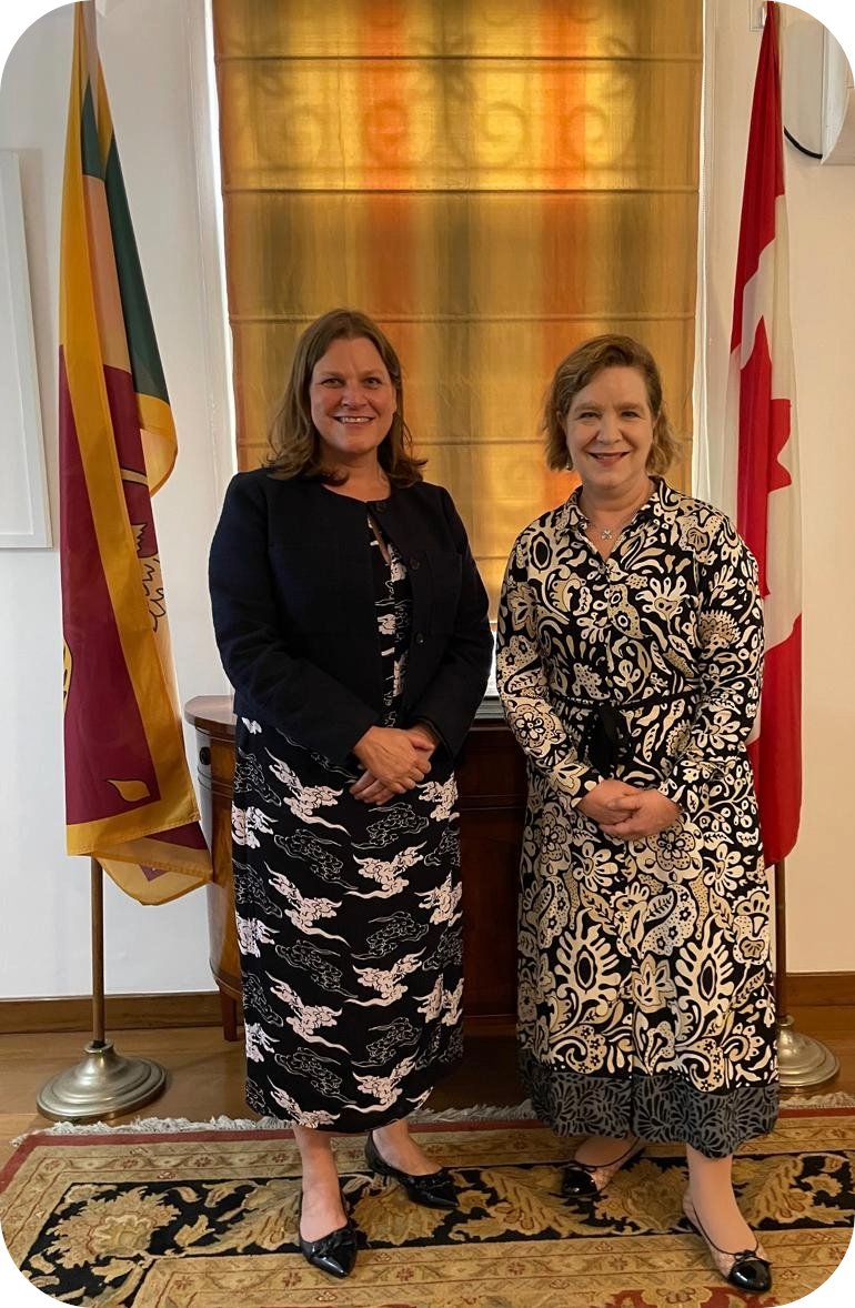 High Commissioner for Canada in Sri Lanka and Maldives, Isabelle Martin 
and  The Asian Development Bank’s  Country Director for Sri Lanka, Shannon Cowlin stand  between the Sri Lankan and Canadian flags.