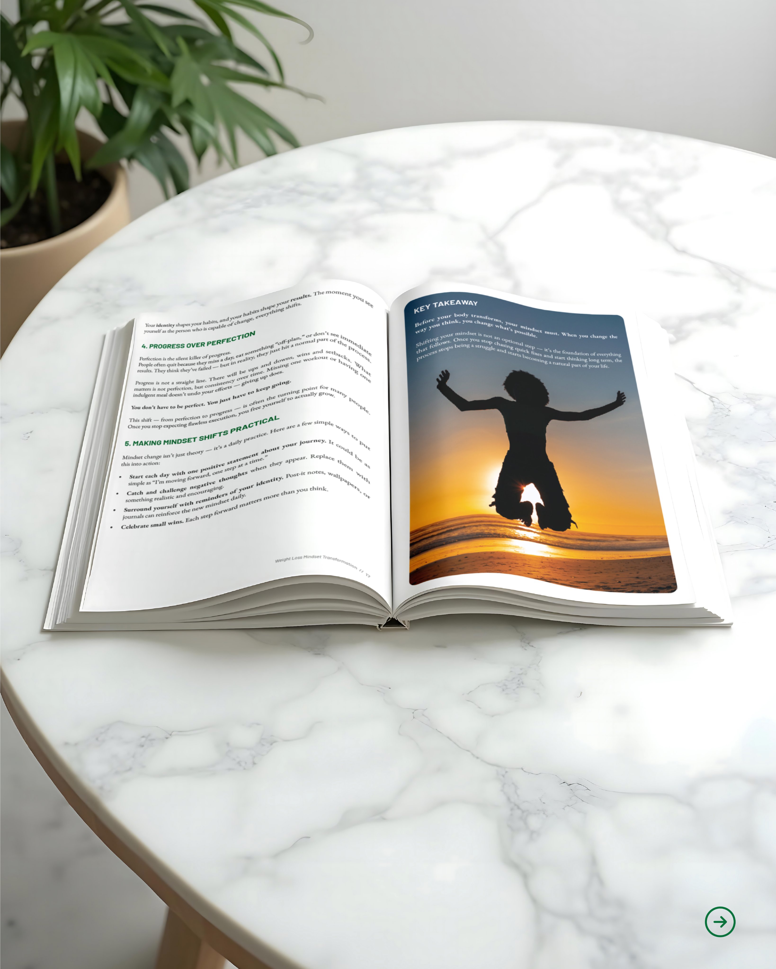 An open book on a marble table showing a key takeaway page with an image of a person jumping at sunset, symbolizing freedom and progress.