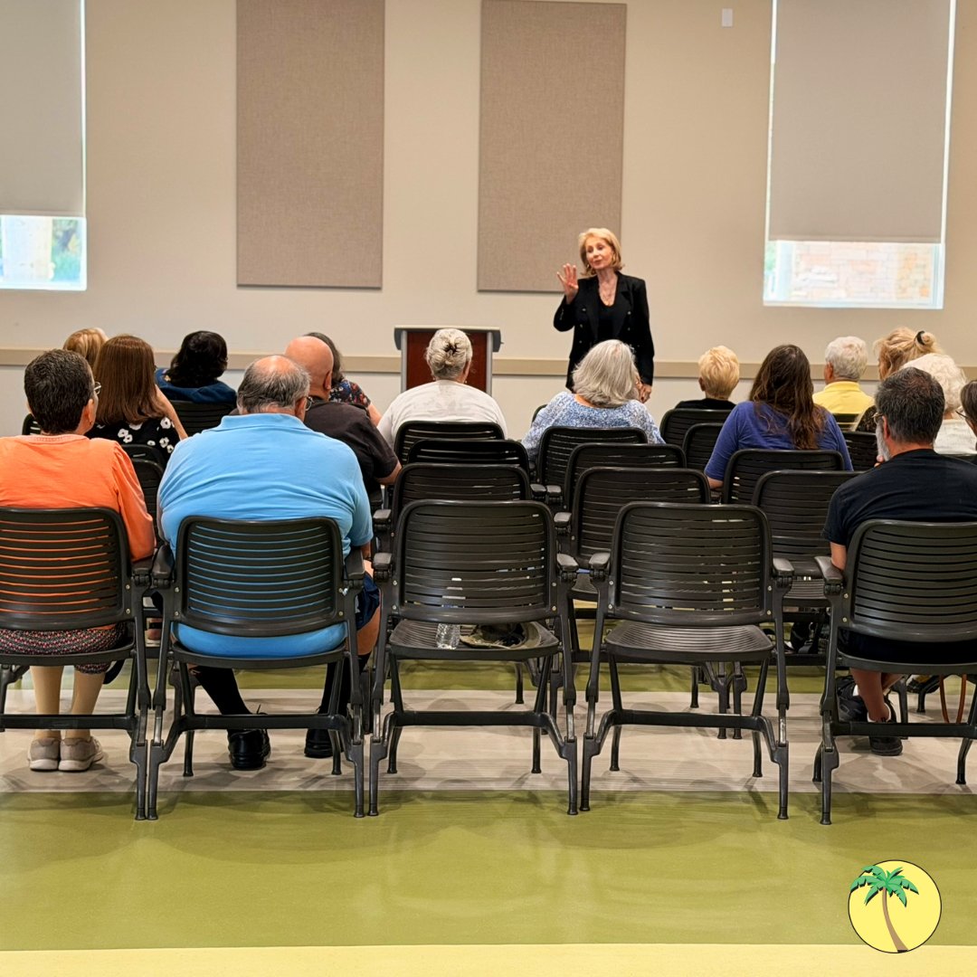Jan speaking to an audience.