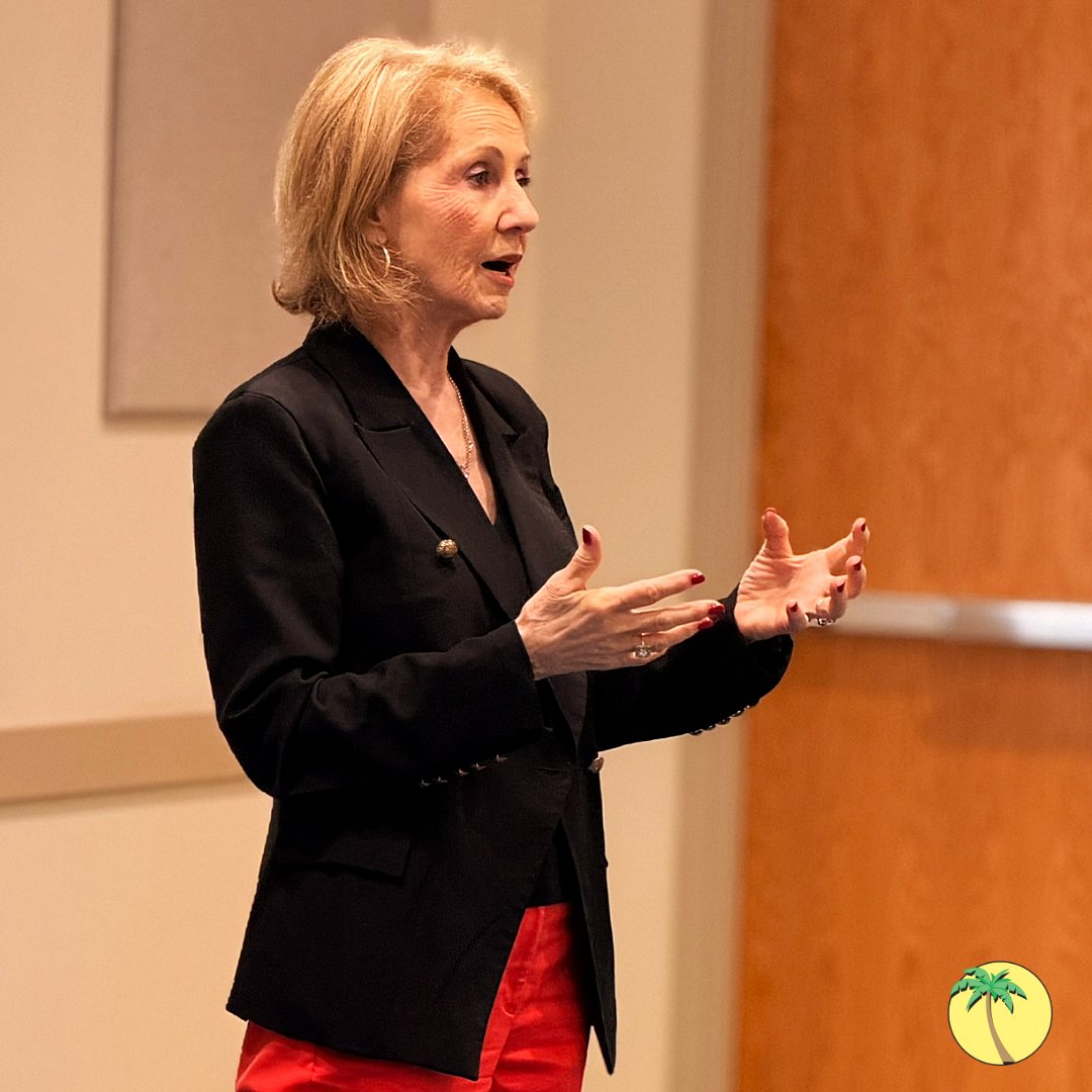 Jan standing and speaking about her book.