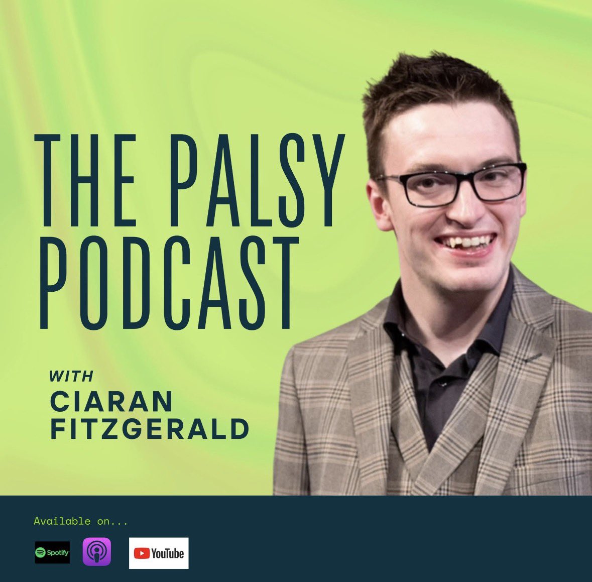 Promotional graphic for ‘The Palsy Podcast with Ciaran Fitzgerald.’ The background is a green gradient. On the right is a smiling man wearing glasses and a plaid blazer over a black shirt. On the left, large text reads ‘The Palsy Podcast,’ with smaller text below reading ‘with Ciaran Fitzgerald.’ At the bottom are platform icons indicating the podcast is available on Spotify, Apple Podcasts, and YouTube.